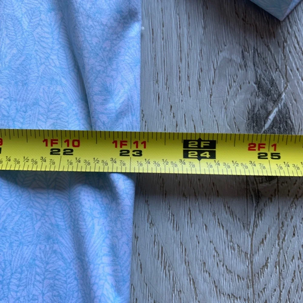 Johnnie-O Clegg Solid Piqué‎ Performance Golf Polo in light blue